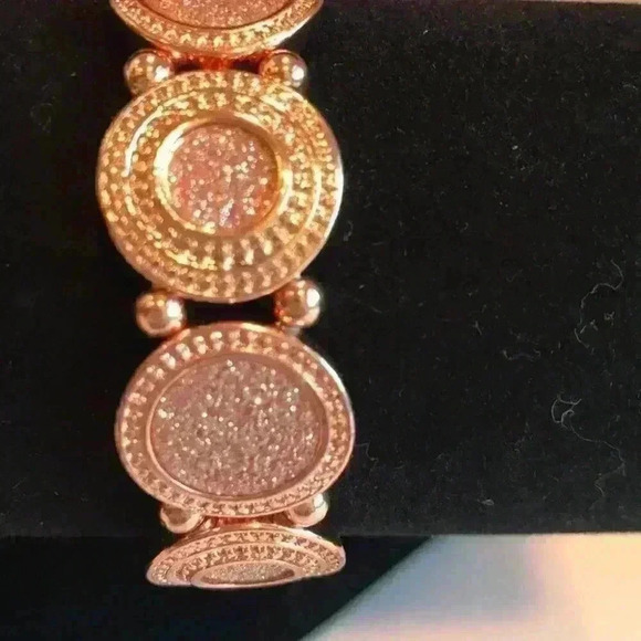 Macy’s new copper colored faux diamond bracelet - Picture 6 of 8